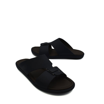 Black slip-on prestige casual footwear with adjustable strap and cushioned sole for comfort