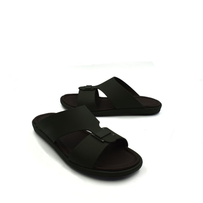 Black slide sandals from Private Collection featuring prestige casual footwear design with buckle straps