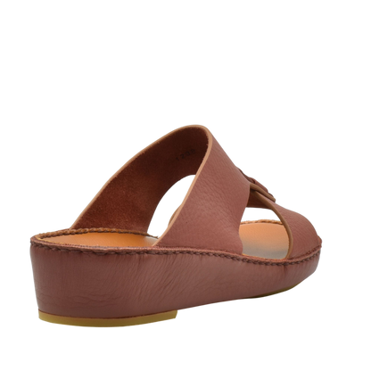 Brown granulato leather footwear slide sandal with open design and cushioned sole from Private collection