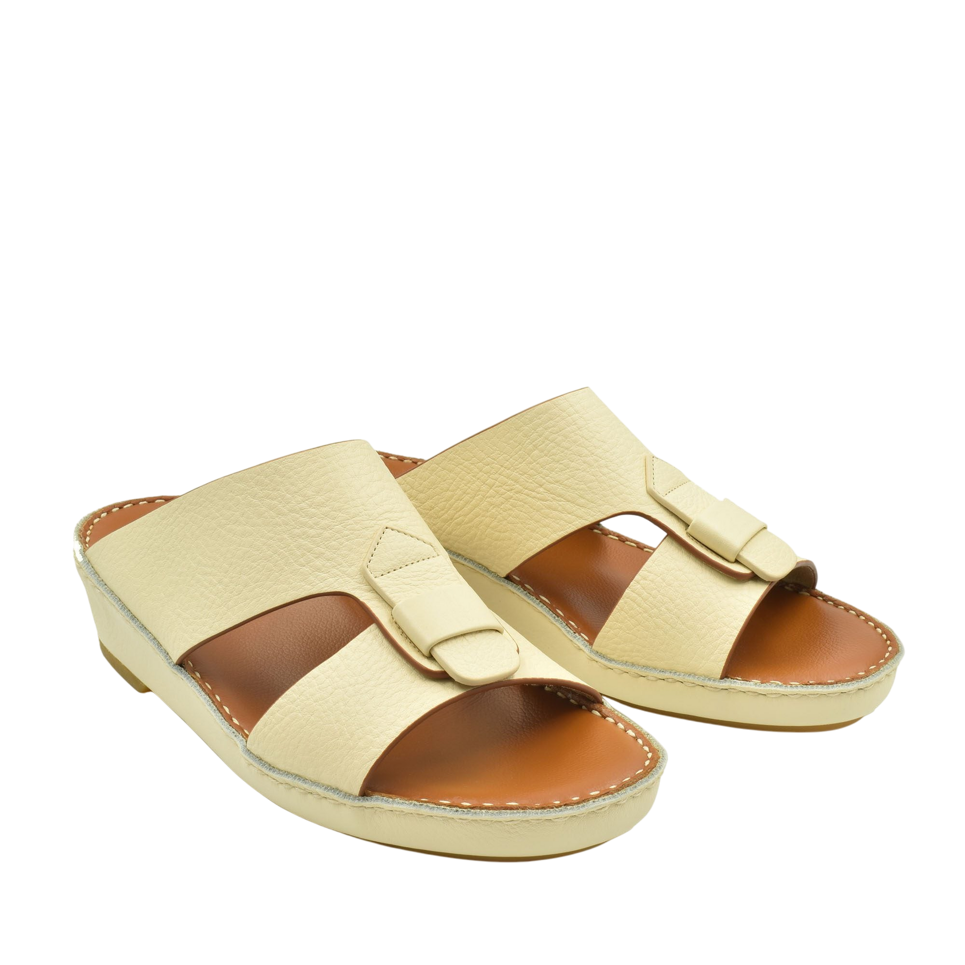 Cream color granulato leather footwear slides with adjustable strap and cushioned sole