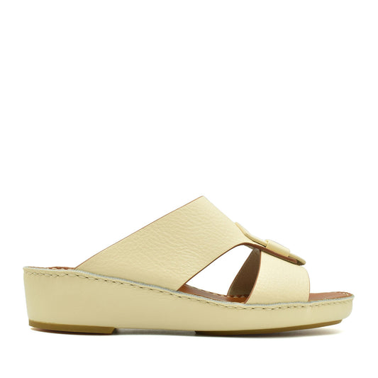 Cream granulato leather footwear slide sandal with low wedge heel from Private collection