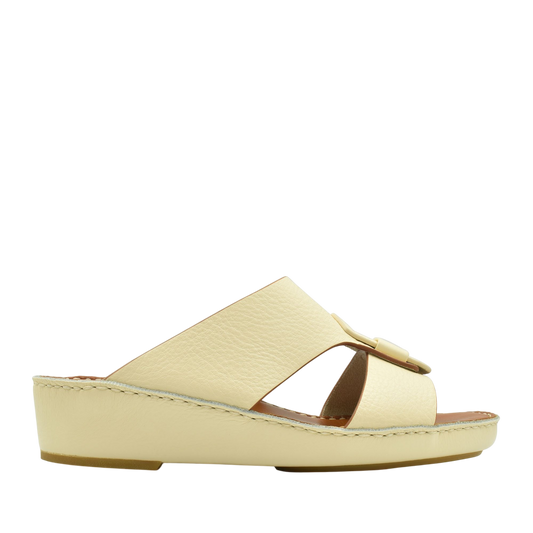 Cream granulato leather footwear slide sandal with low wedge heel from Private collection