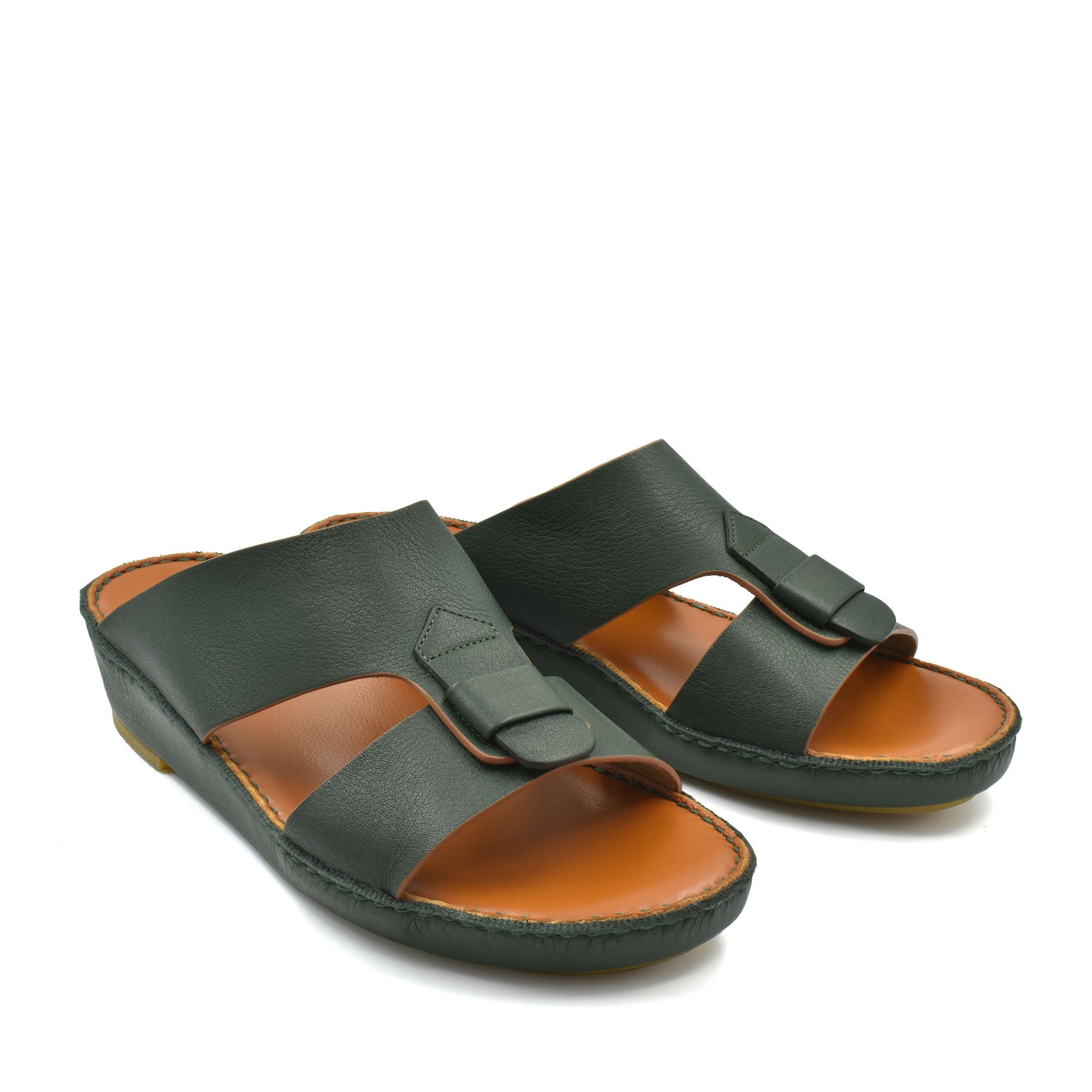 Black granulato leather footwear slide sandals with adjustable buckle straps and tan cushioned footbed