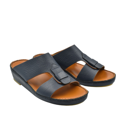 Black granulato leather footwear slide sandals with adjustable straps and tan cushioned insoles