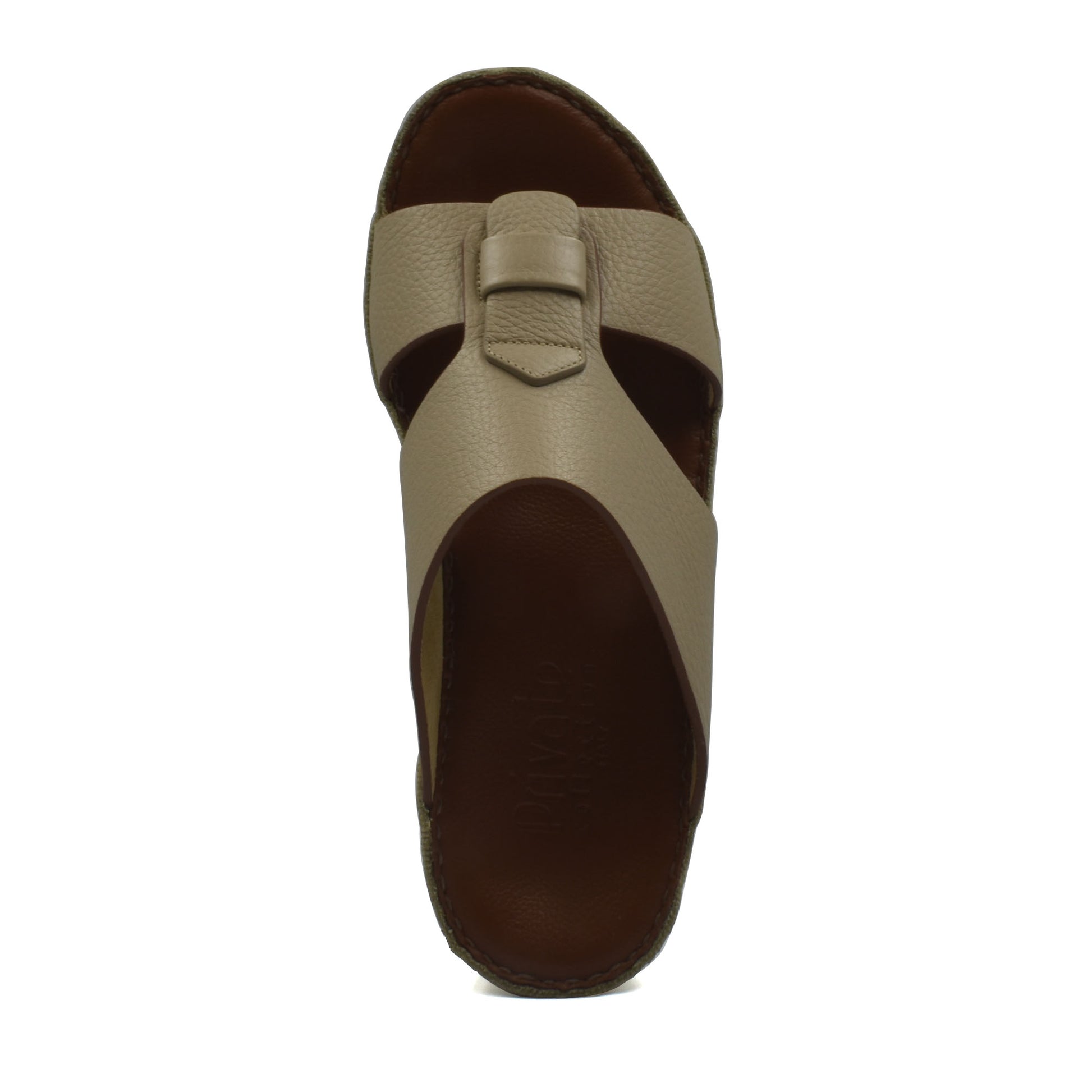 Top view of beige granulato leather footwear slide sandal with brown sole from private collection