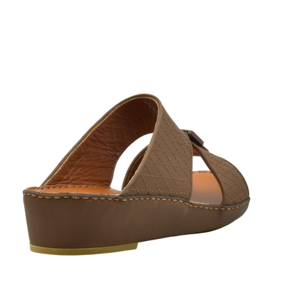 Side view of brown luxury calf leather sandals with cushioned sole and quilted strap design