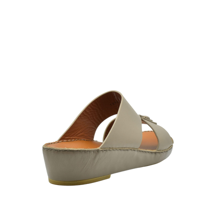 Beige slip-on luxury leather sandals with cushioned footbed and open toe design