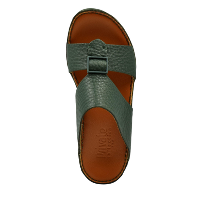 Green luxury leather sandals with adjustable buckle strap and brown cushioned footbed