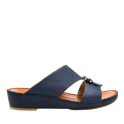 Side view of navy blue luxury leather sandals with cushioned sole from private collection