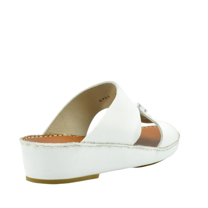 White luxury leather sandals with wedge heel and cross strap design from private collection