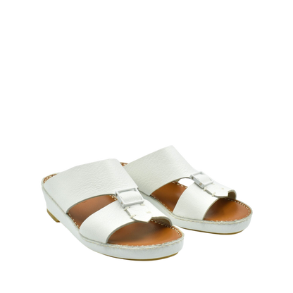 White luxury leather sandals with buckle detail and cushioned sole from private collection