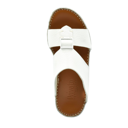 Top view of white luxury leather sandals with brown sole and stitched edges from Private collection