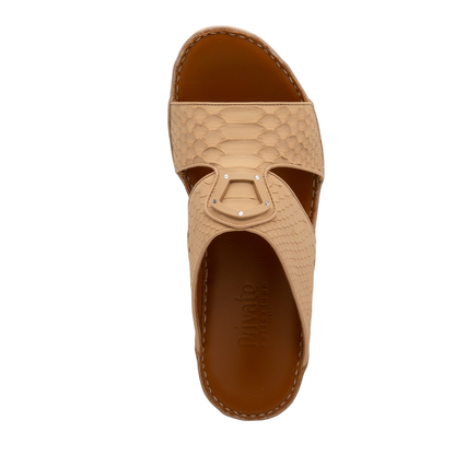 Top view of luxury python sandals in beige with detailed textured straps and cushioned brown sole