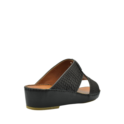 Black wedge luxury python sandals with textured python skin upper and tan insole from Private collection