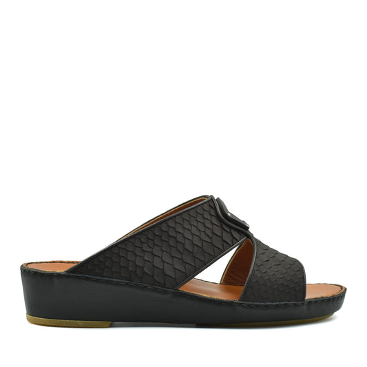 Black luxury python sandals with textured straps and cushioned sole from private collection