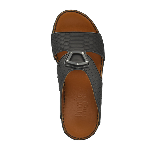 Top view of luxury python sandals in black with brown leather footbed and metal buckle detail