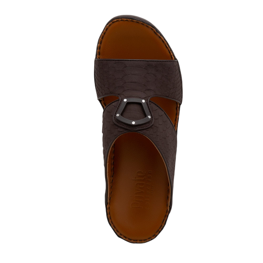 Top view of luxury python sandals in dark brown with leather footbed and metal accent buckle