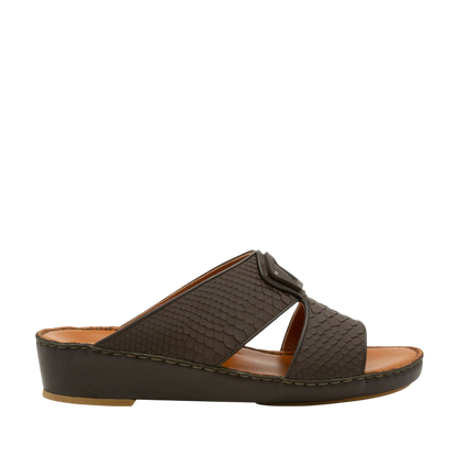 Side view of luxury python sandals with brown textured straps and cushioned sole