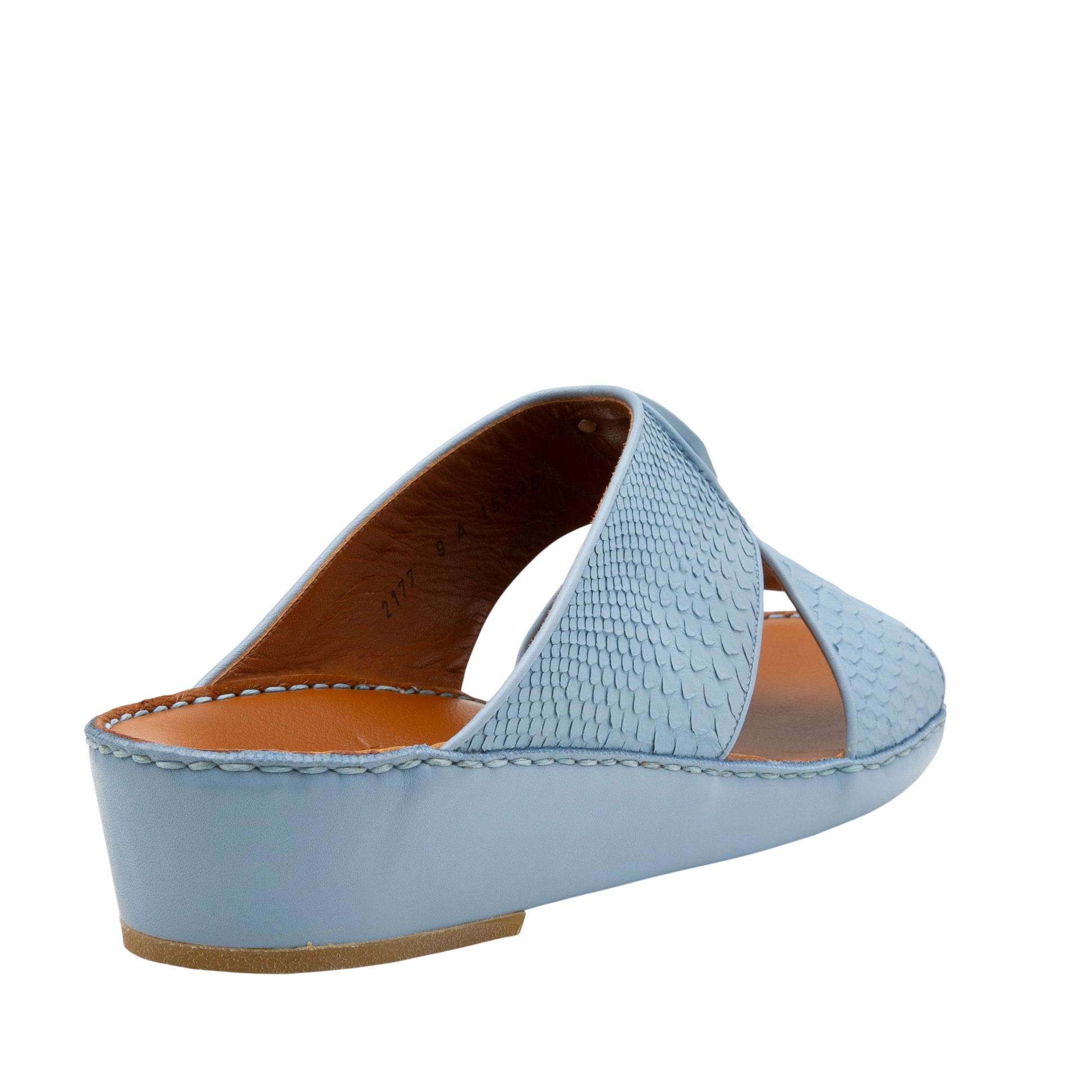 Light blue luxury python sandals with textured straps and low wedge heel for elegant comfort