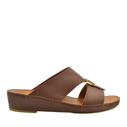 Brown metallic deercalf slides with a low wedge heel and open toe design from Private collection