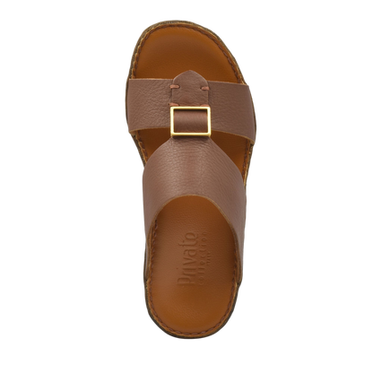 Top view of brown metallic deercalf slides with buckle detail and cushioned footbed
