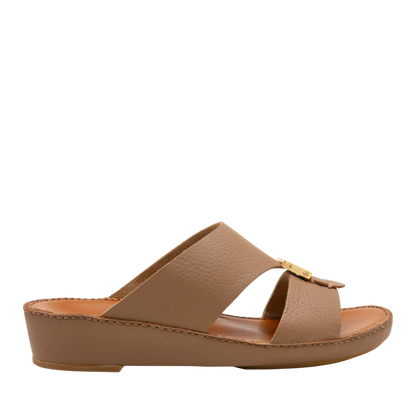 Side view of taupe leather metallic deercalf slides with open toe and low wedge heel