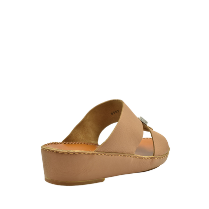Tan leather metallic deercalf slides with a low wedge heel and open toe design