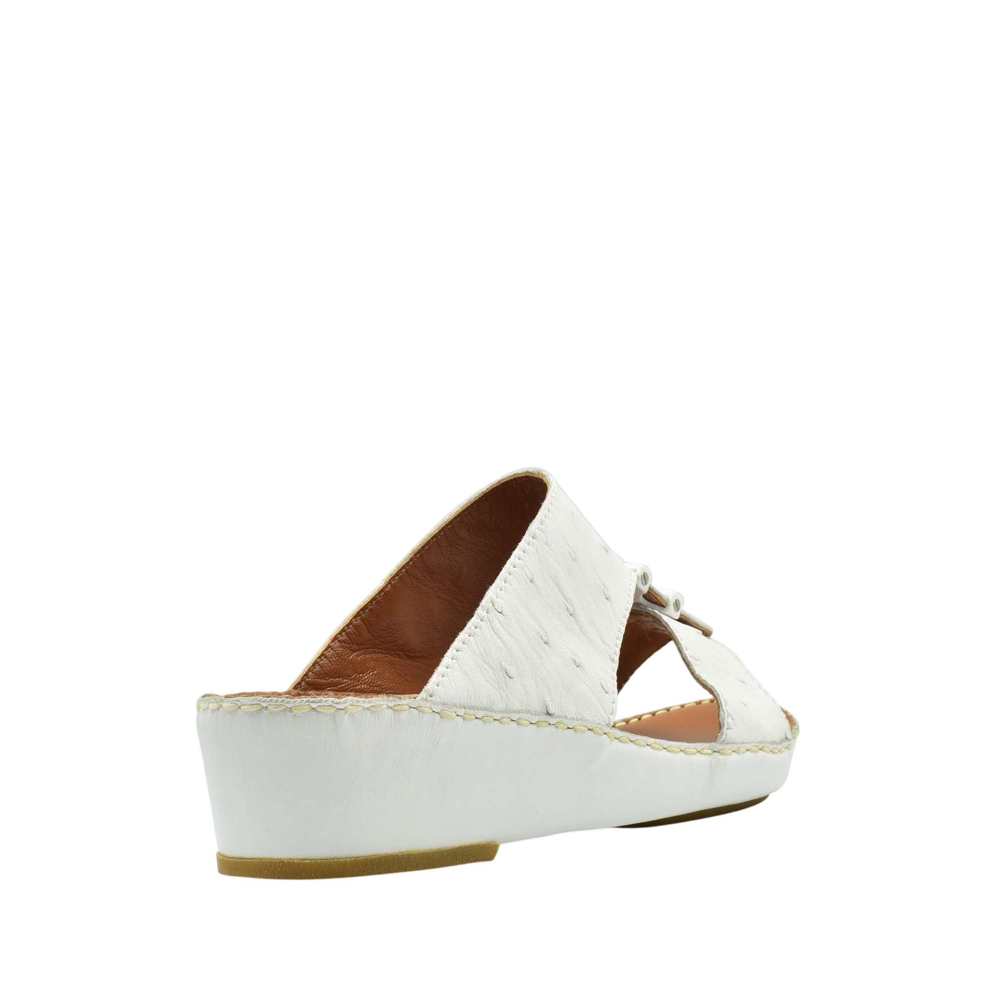 White ostrich leather sandals with wedge heel and open toe design from Private Collection