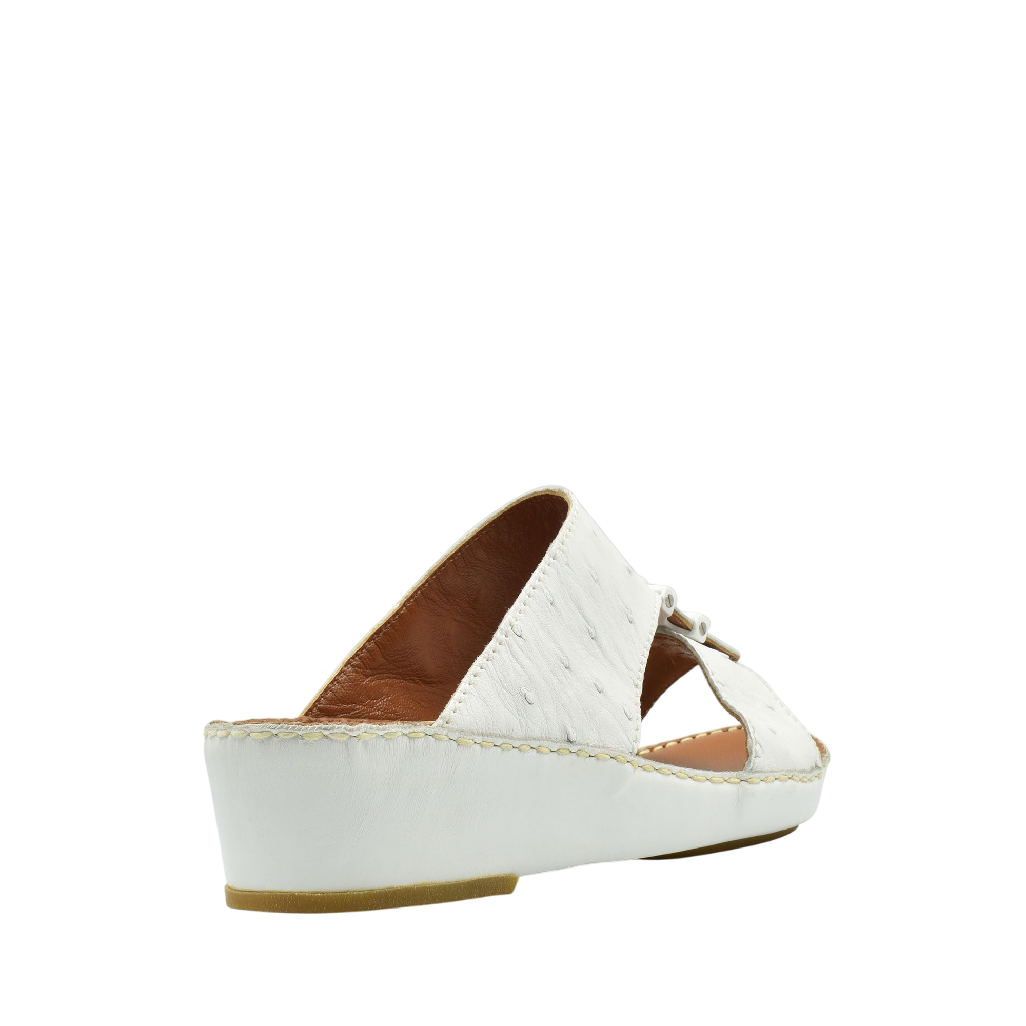 White ostrich leather sandals with wedge heel and open toe design from Private Collection