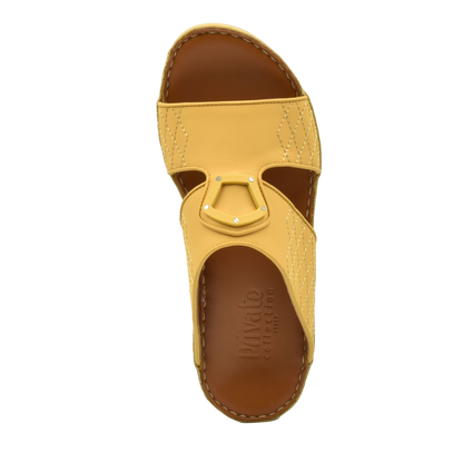 Yellow premium slip-on sandals with stitched detailing and brown cushioned footbed from Private collection