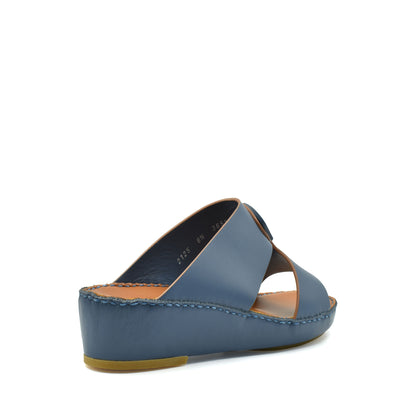 Blue natural leather slide shoes with open toe and low wedge heel from private collection