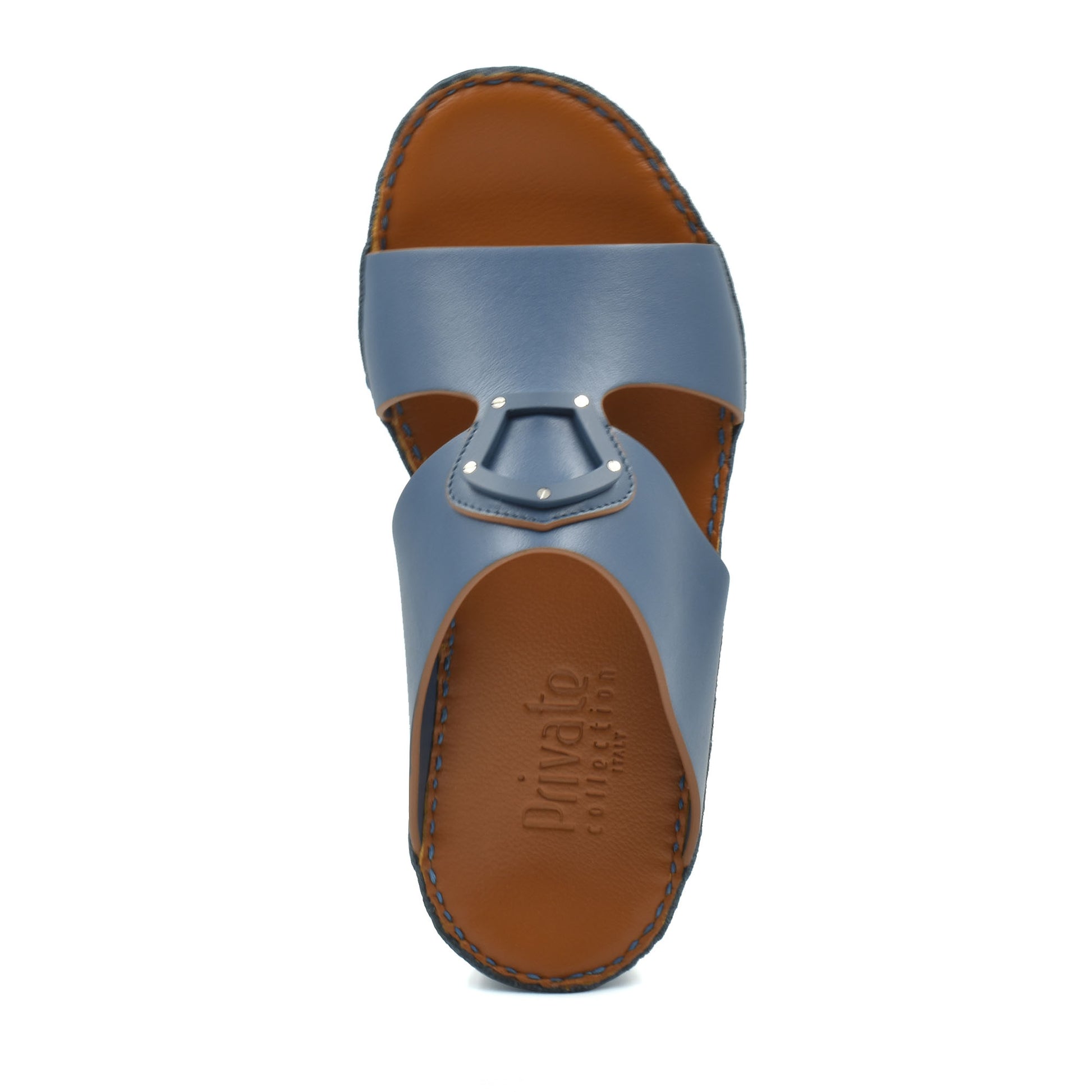 Blue and brown natural leather slide shoes from Private collection with stitched sole detail
