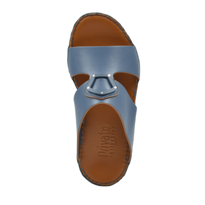 Blue and brown natural leather slide shoes from Private collection with stitched sole detail