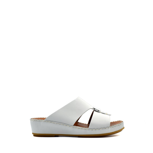 White private rubbercalf kids sandal with adjustable strap and cushioned sole in side view