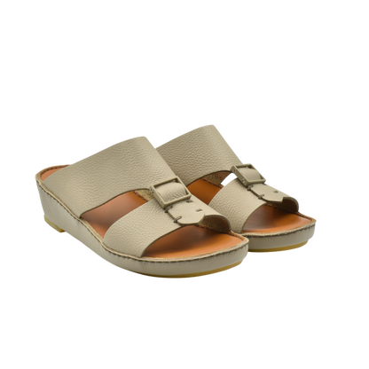 Beige classic leather sandals with adjustable straps and cushioned soles from Private Collection