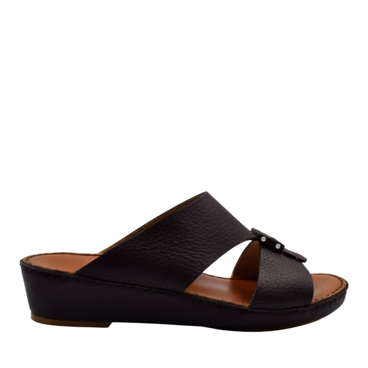 Black classic leather sandals with cross straps and low wedge sole from Private Collection