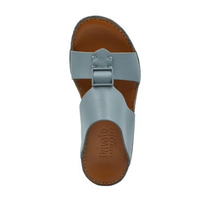 Top view of blue classic leather sandals with brown sole and adjustable strap