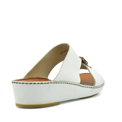 White classic leather sandals with wedge heel and open toe design from Private Collection
