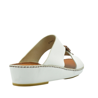 White classic leather sandals with wedge heel and open toe design from Private Collection