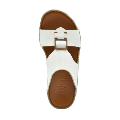White classic leather sandals with adjustable buckle and brown footbed from Private Collection