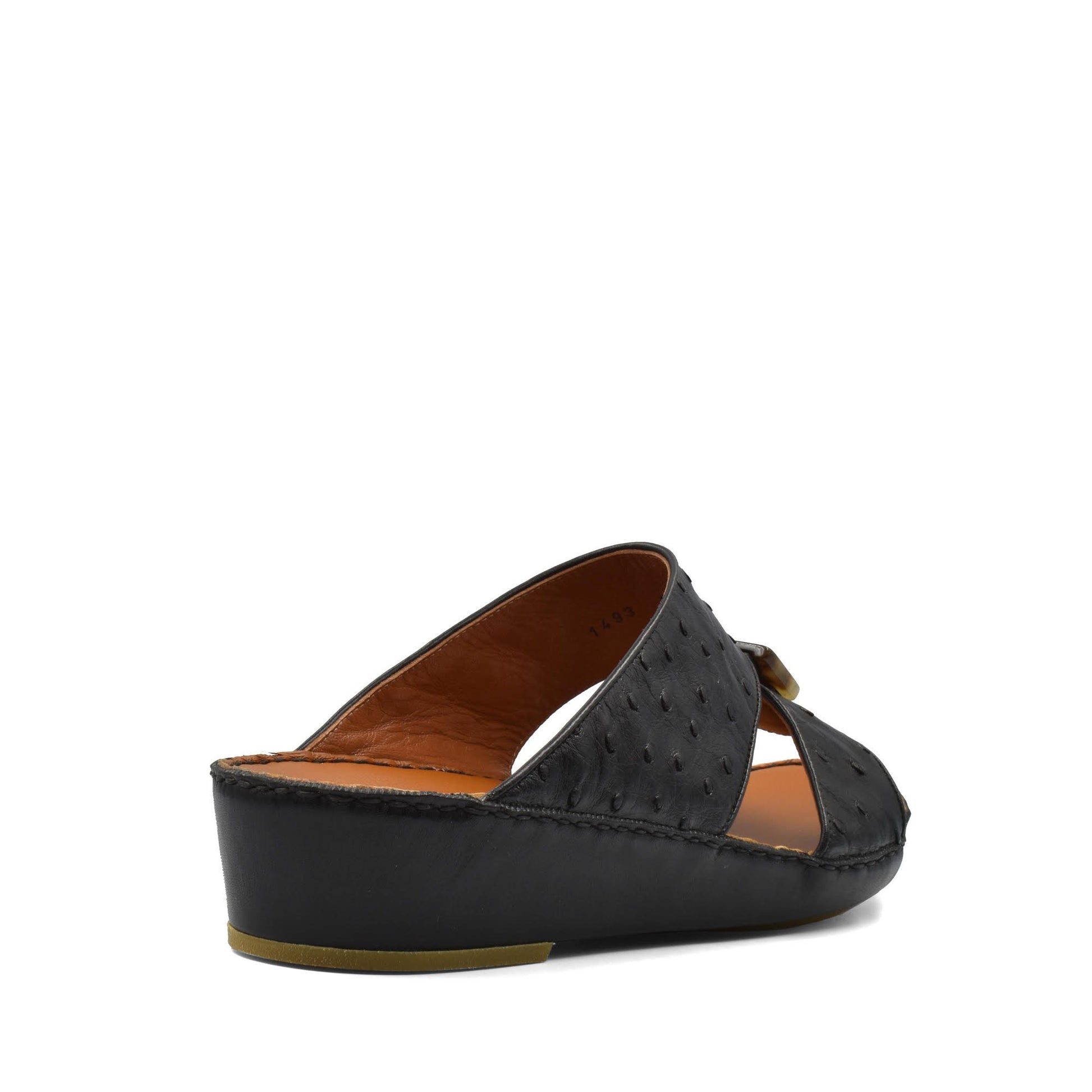 Black ostrich leather sandals with wedge heel and open toe design from private collection