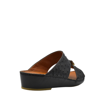 Black ostrich leather sandals with wedge heel and open toe design from private collection