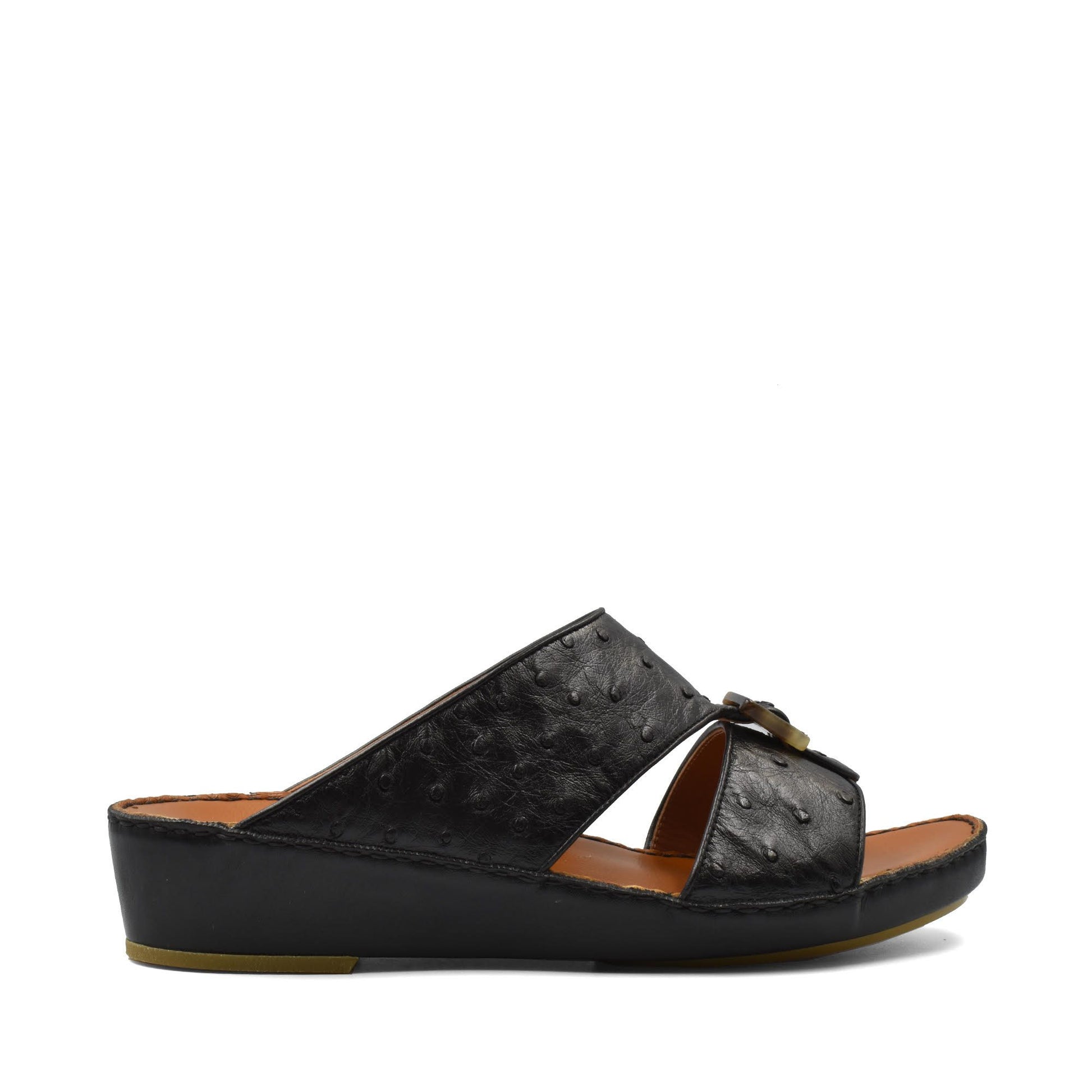 Black ostrich leather sandals with cushioned sole and open toe slide design