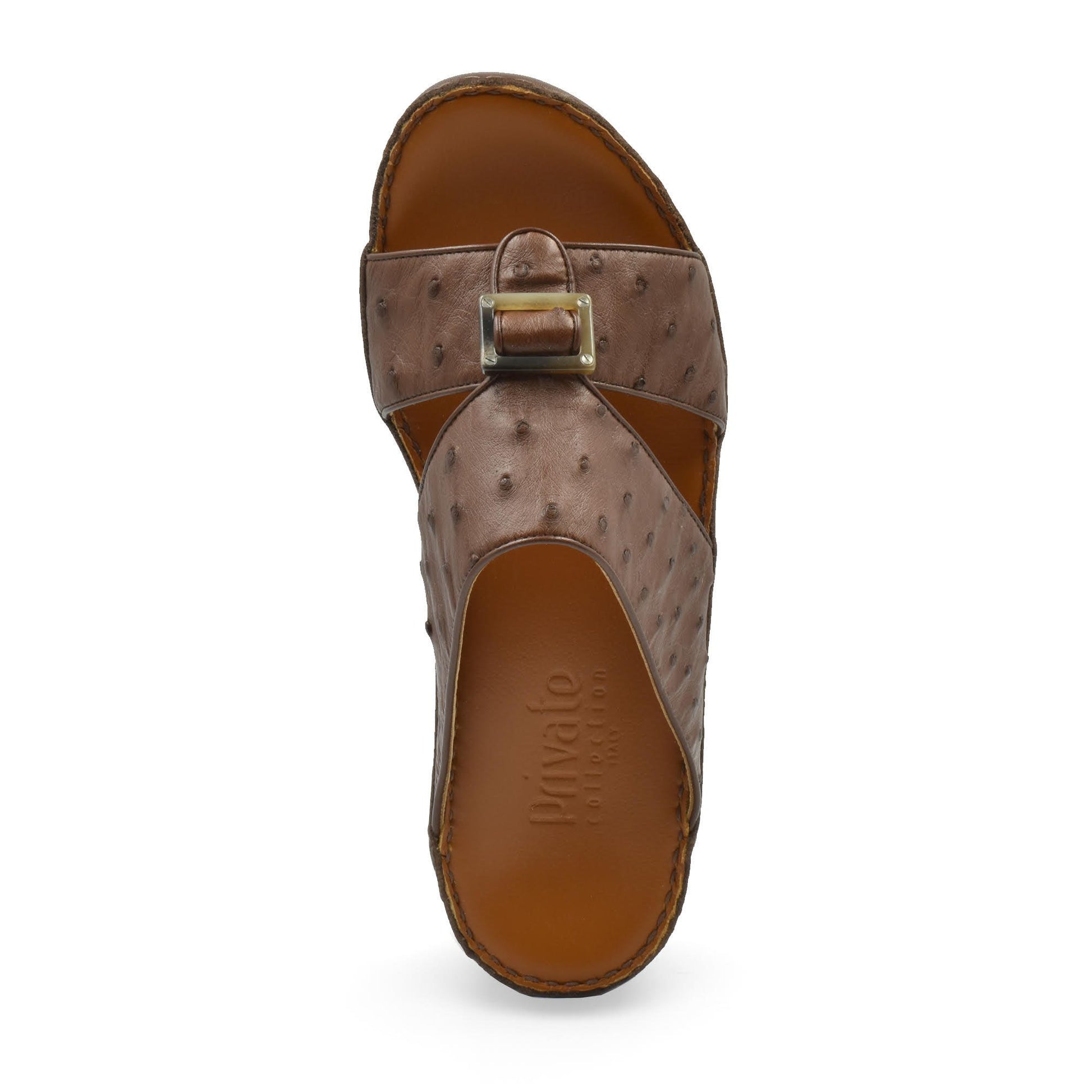 Brown ostrich leather sandals with a buckle design from Private Collection shown from a top view