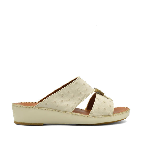 Cream-colored ostrich leather sandals with wedge heel and open toe design