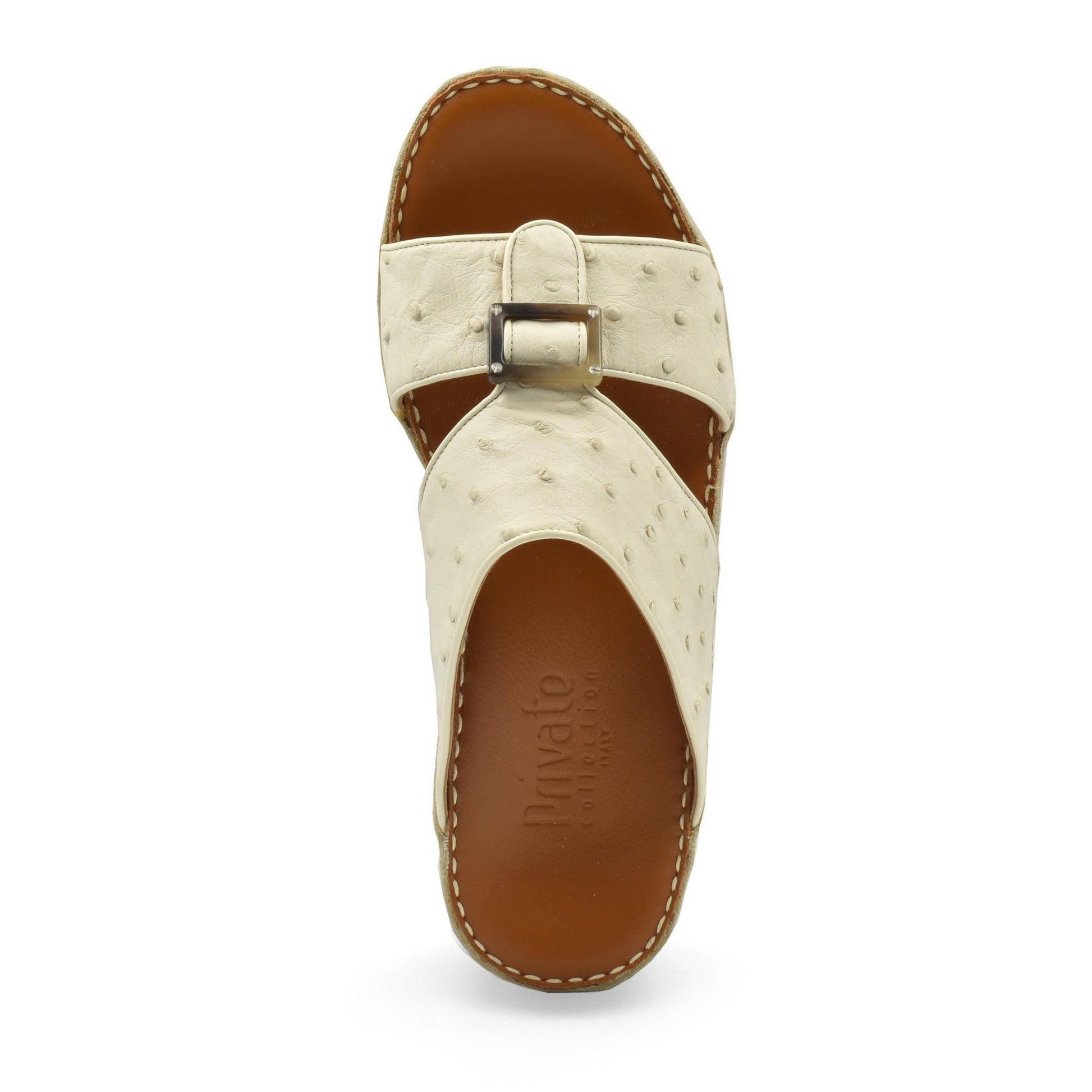Cream ostrich leather sandals with buckle strap and brown leather footbed from Private collection