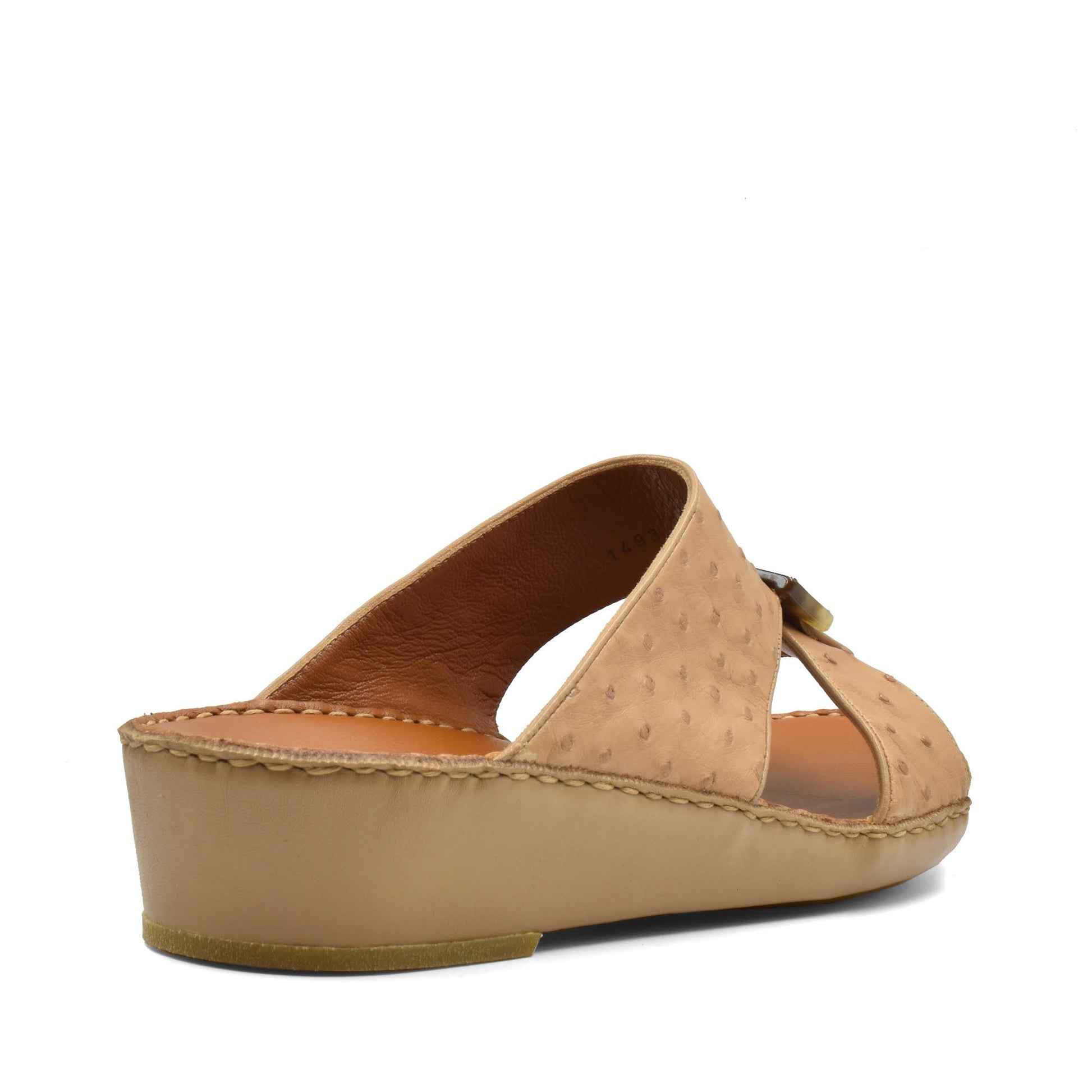 Tan ostrich leather sandals with wedge heel and open toe design from Private collection