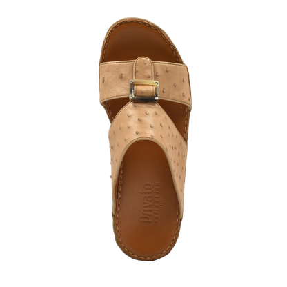 Top view of beige ostrich leather sandals with buckle detail from Private collection