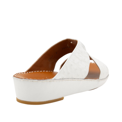 White ostrich leather sandals with tan insole and low wedge heel from Private Collection