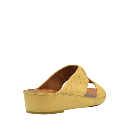 Yellow ostrich leather sandals with wedge heel and open toe design from Private collection